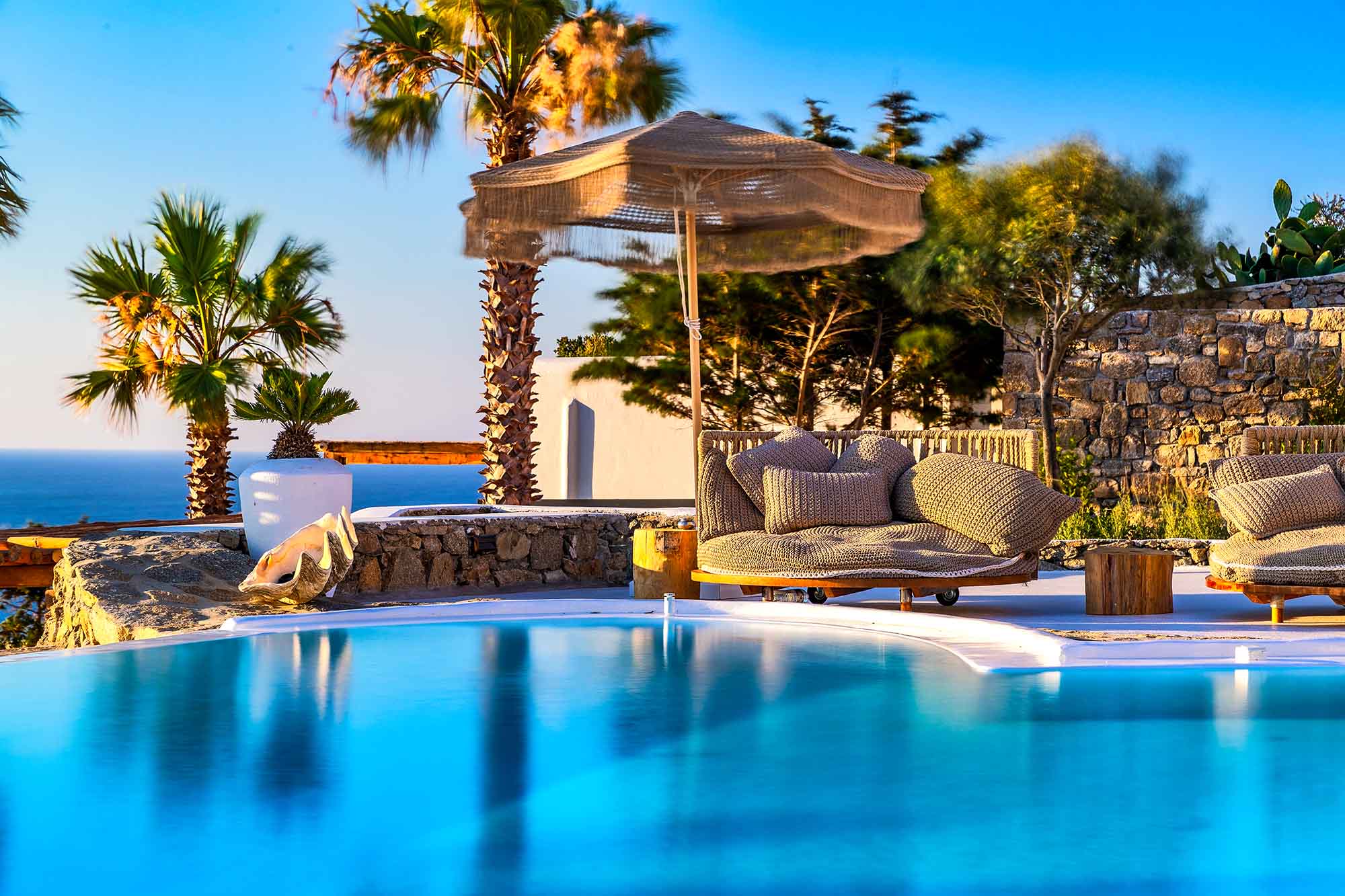 RENT A LUXURIOUS VILLA BY THE SEA IN MYKONOS - VILLA KARKOS - swimming pool with sea view